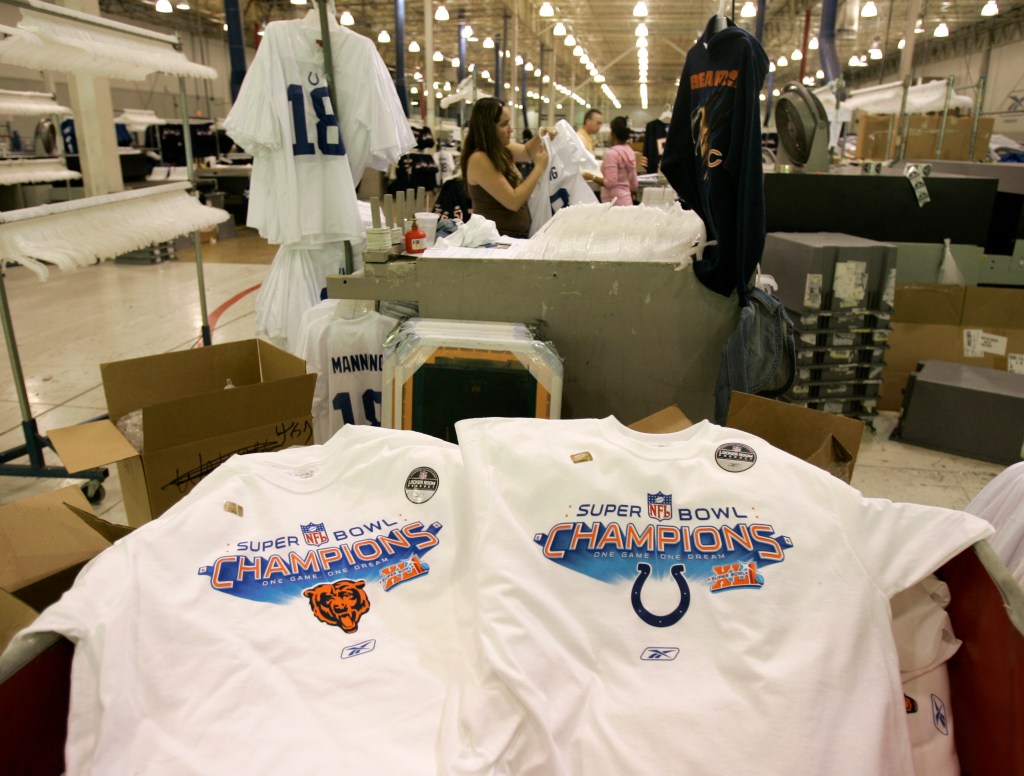 Pre-made merchandise sits in a factory declaring both the Indianapolis Colts and the Chicago Bears as victors before the 2007 Super Bowl.