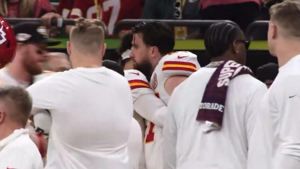 The Kansas City Chiefs athletes hugged while expressing their love for each other.