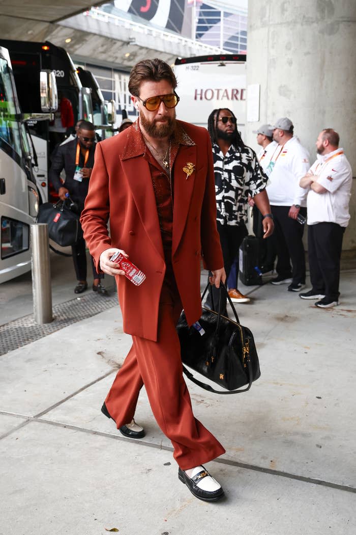 Travis Kelce in retro suit with sunglasses