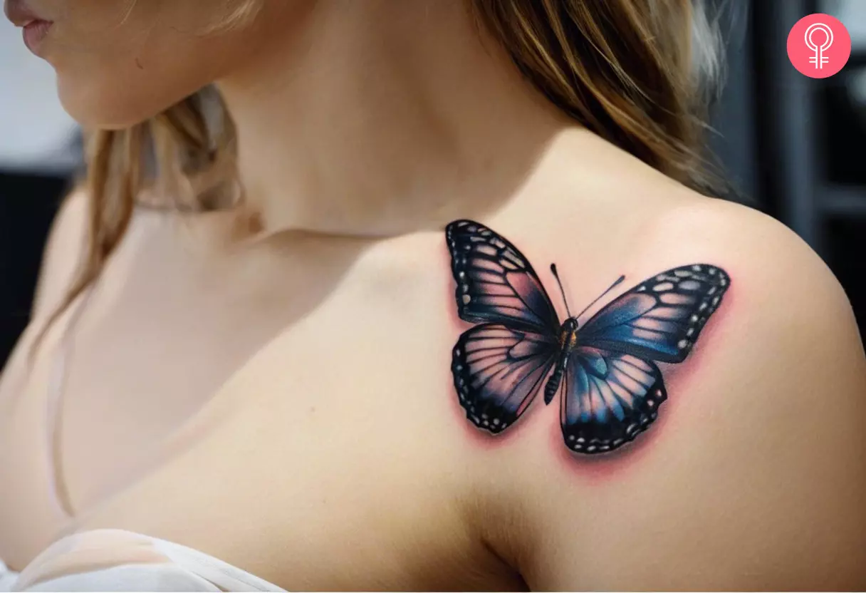 A 3D butterfly tattoo near a woman’s shoulder