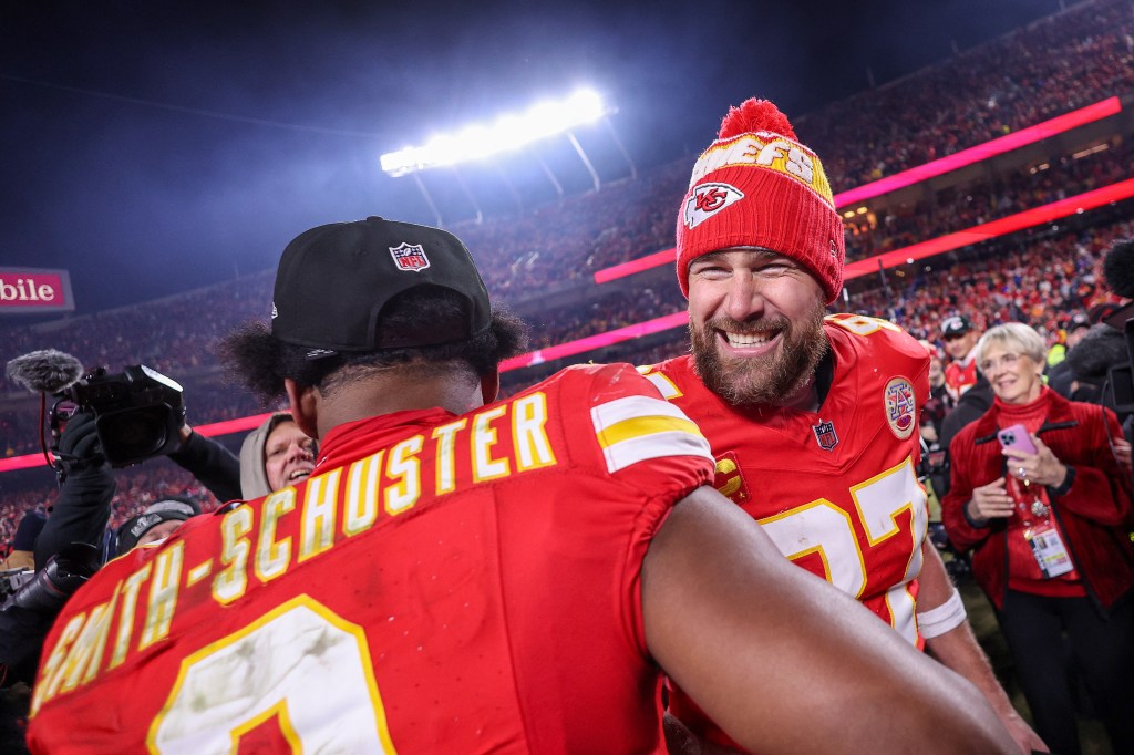 JuJu Smith-Schuster #9 and Travis Kelce #87 of the Kansas City Chiefs celebrate after defeating the Buffalo Bills 32-29 in the AFC Championship Game at GEHA Field at Arrowhead Stadium on January 26, 2025 in Kansas City, Missouri.