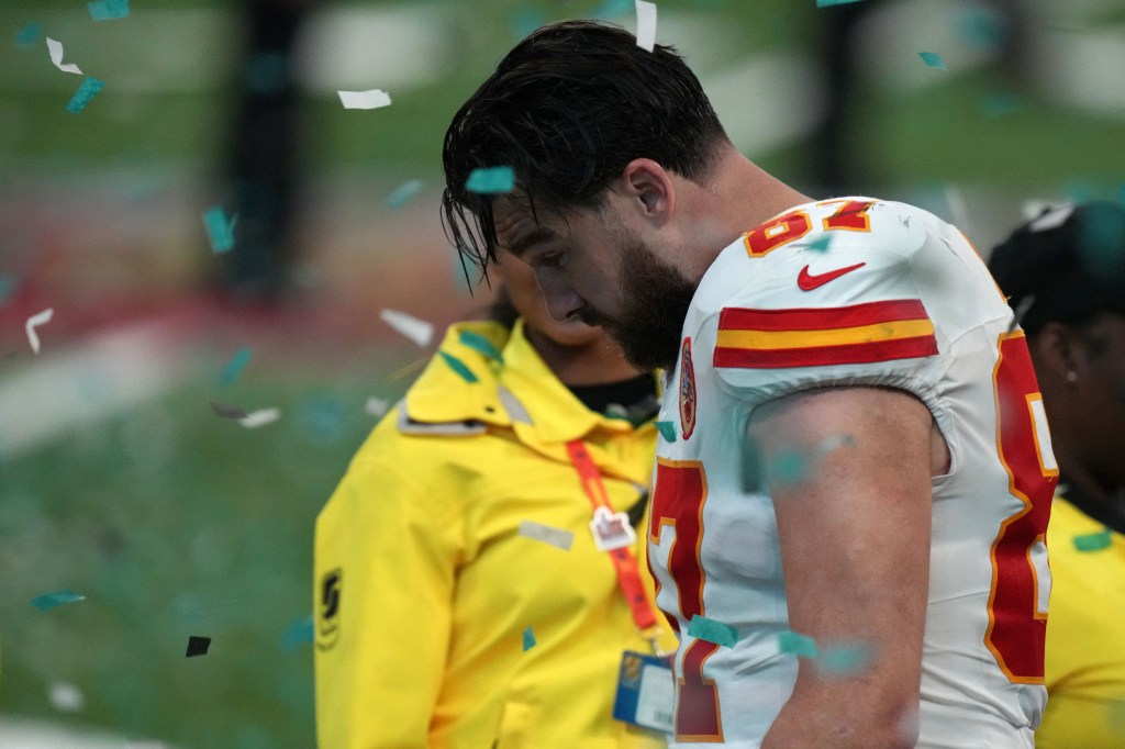 Travis Kelce, the Kanas City Chiefs tight-end, hangs his head low after losing the Super Bowl.