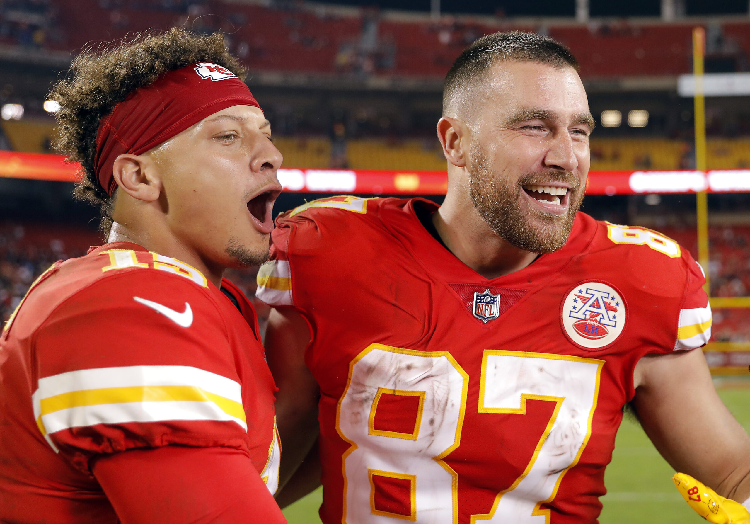 Patrick Mahomes #15 and Travis Kelce #87 of the Kansas City Chiefs celebrate after the Chiefs defeated the Las Vegas Raiders 30-29 to win the game at Arrowhead Stadium on October 10, 2022 in Kansas City, Missouri.