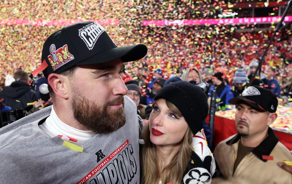 Travis Kelce #87 of the Kansas City Chiefs celebrates with Taylor Swift after the Chiefs defeated the Buffalo Bills 32-29 to win the AFC Championship Game at GEHA Field at Arrowhead Stadium on January 26, 2025 in Kansas City.