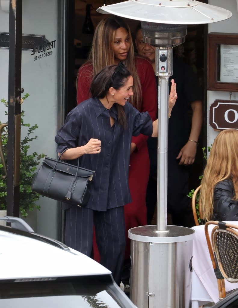 Markle greeted the eatery’s owner, Gene Montesano. Clint Brewer Photography / BACKGRID