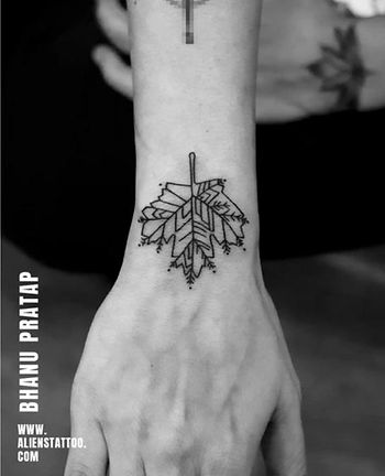 leaf symbol tattoo