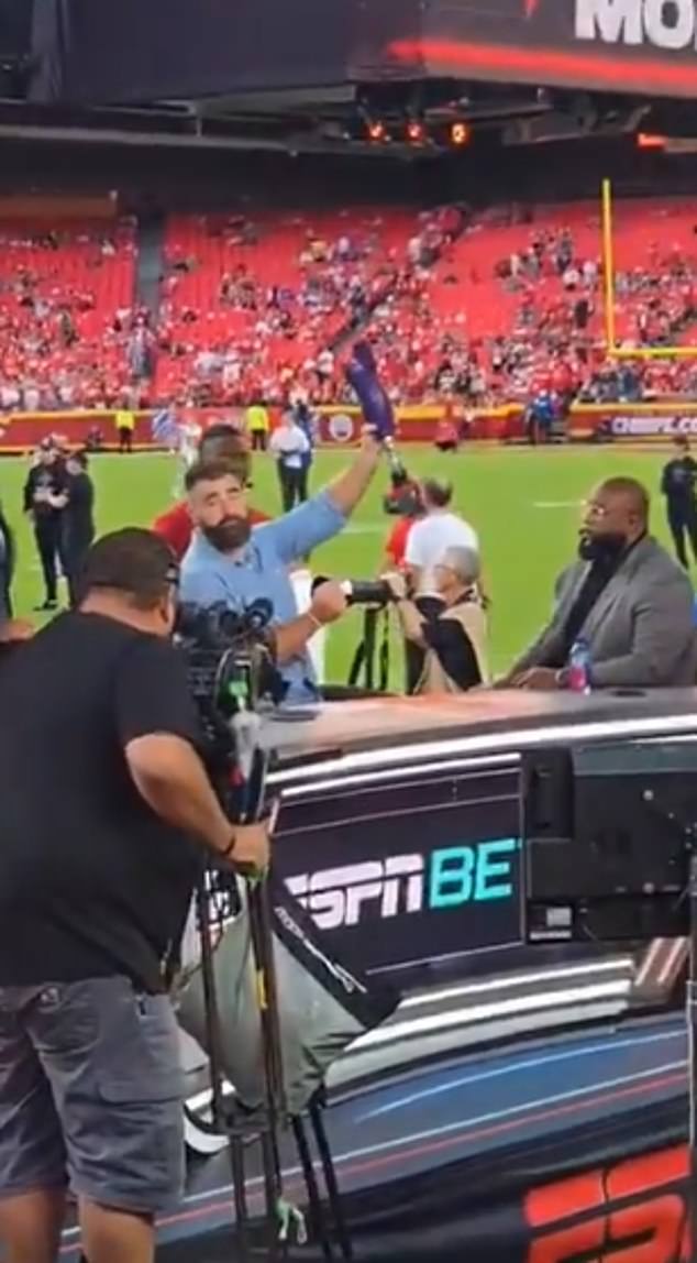 Kelce also took the time to sign a fans' purple prosthetic leg with the rest of the ESPN crew