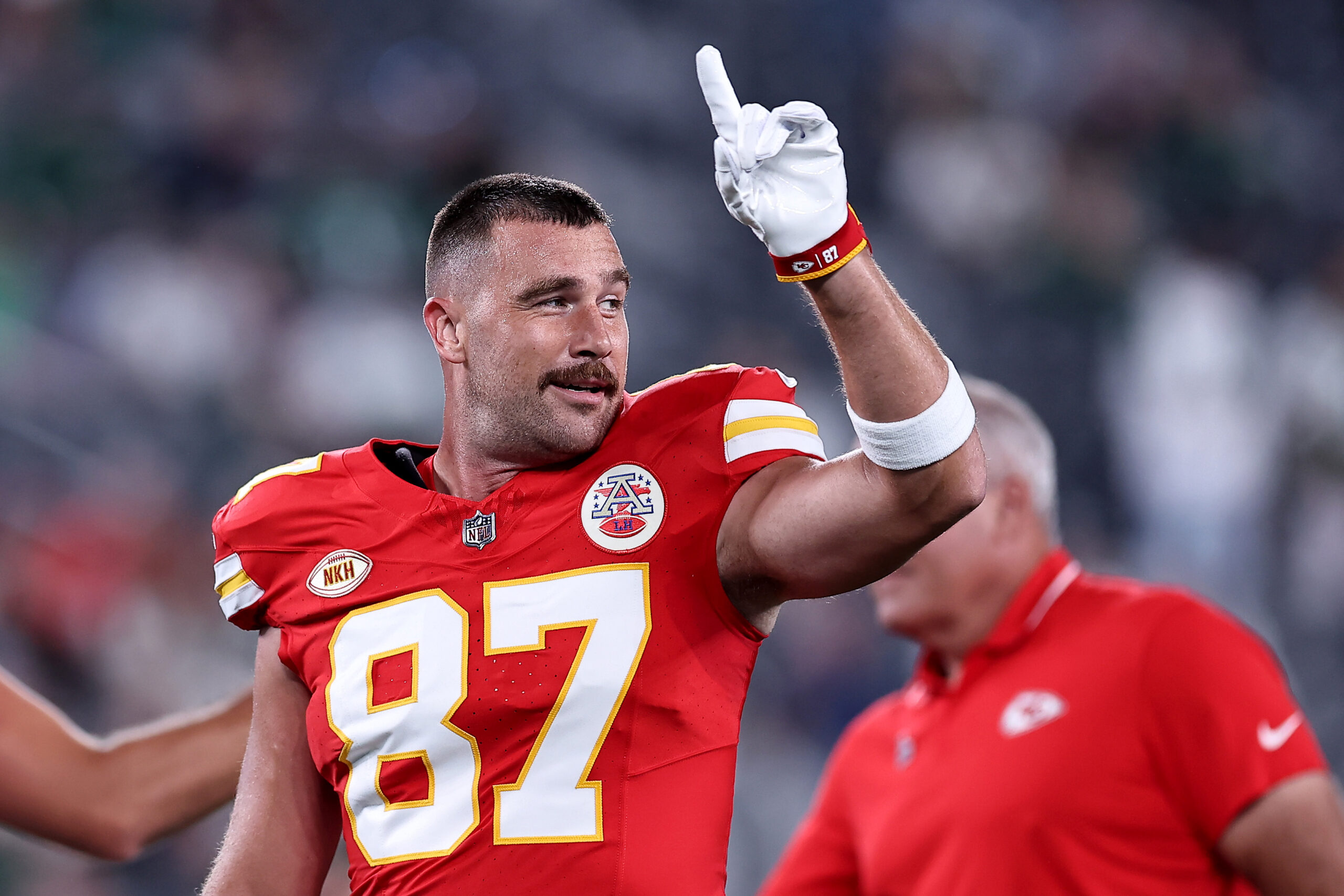 Travis Kelce playing football