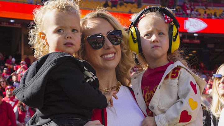 Brittany Mahomes and children watch warmups prior to game between the Kansas City Chiefs and the Denver Broncos at GEHA Field at Arrowhead Stadium. Brittany Mahomes and children watch warmups prior to game between the Kansas City Chiefs and the Denver Broncos at GEHA Field at Arrowhead Stadium.
