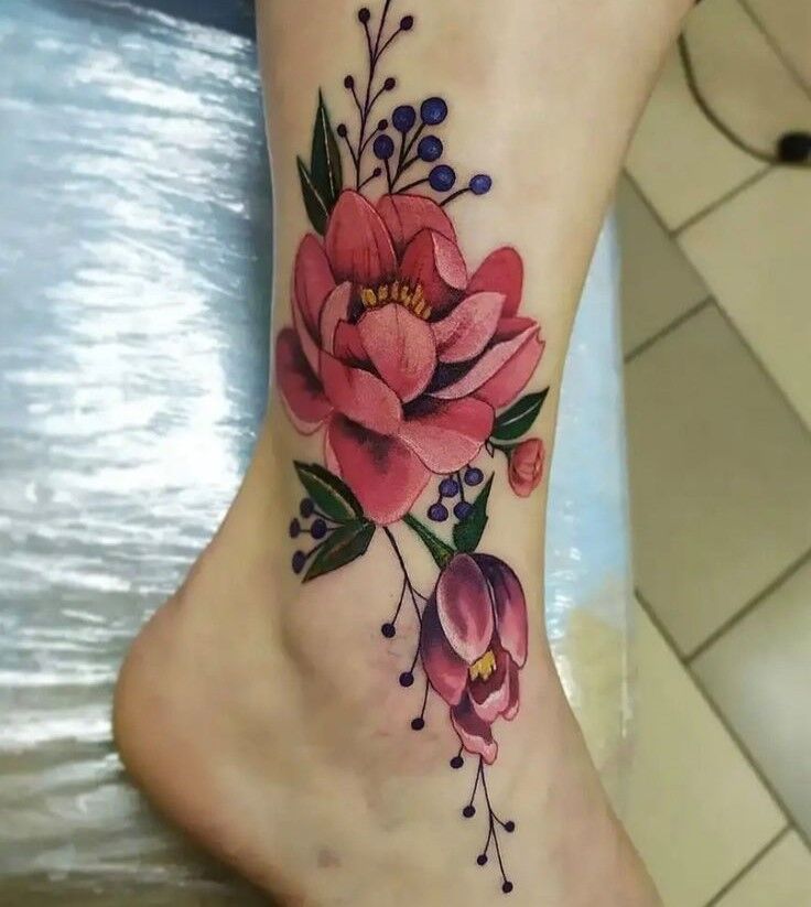 Gentle red rose ankle tattoo, symbol of love and romance