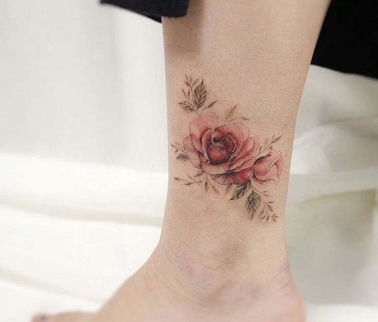 Rose ankle tattoo is gentle, delicate and feminine