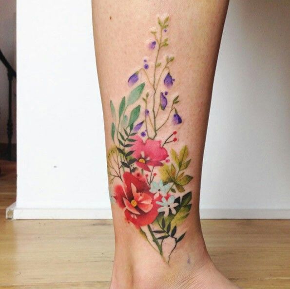 Colorful flower ankle tattoo, fresh and radiant