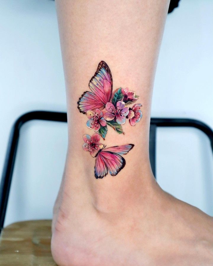 Beautiful butterfly ankle tattoo, symbolizing transformation and freedom