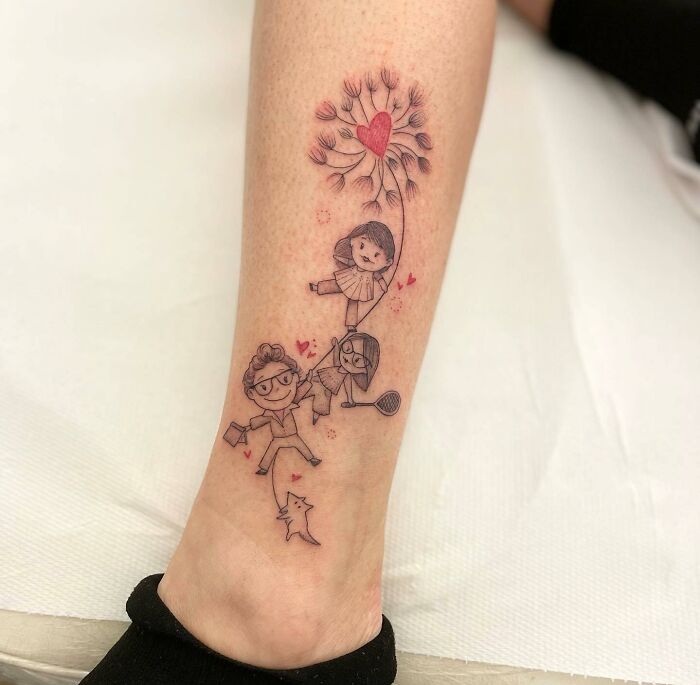 Tattoo of a family holding hands with heart and dandelion, symbolizing unbreakable bonds. Tattoo of a family holding hands with heart and dandelion, symbolizing unbreakable bonds.