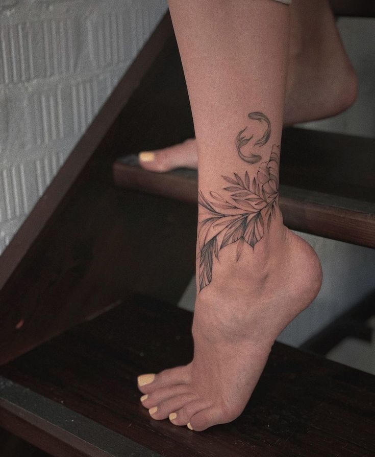 Stylized ankle tattoo, full of art and creativity