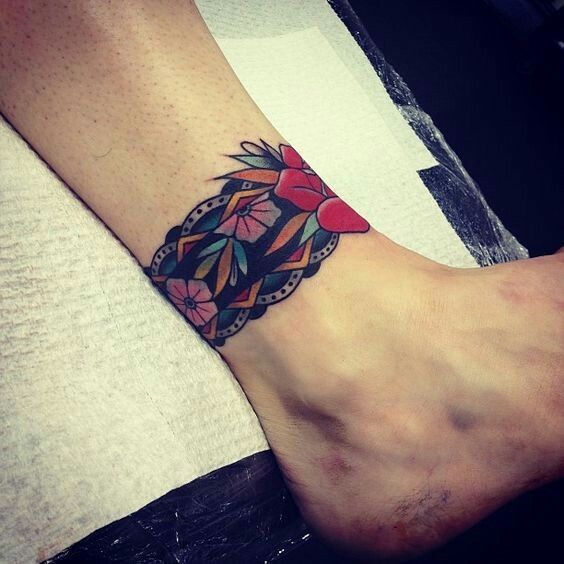 Colorful ankle tattoo, creating impressive highlights