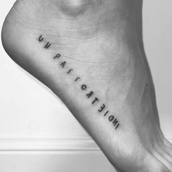 foot quote tattoo on side