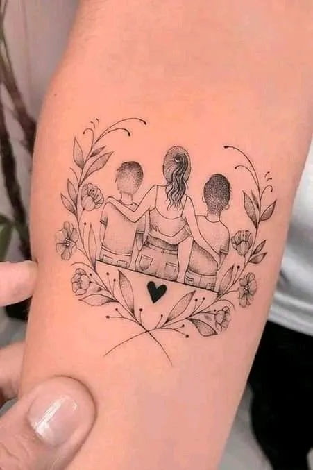 Mother and son tattoo with simple but warm design, showing boundless love.