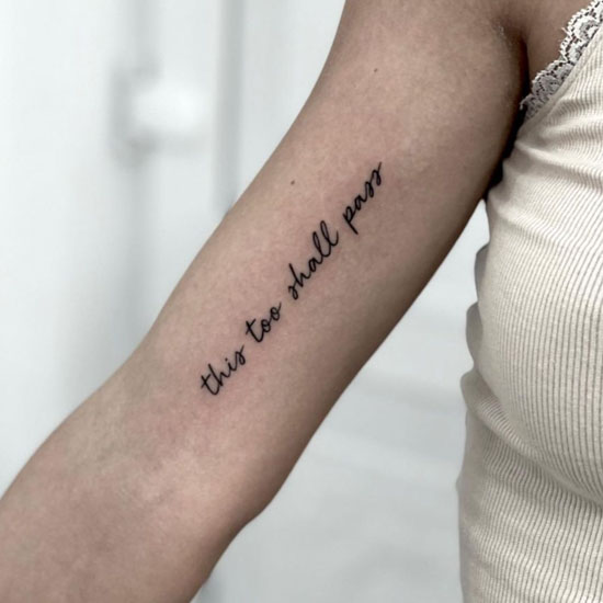 inner bicep quote tattoo