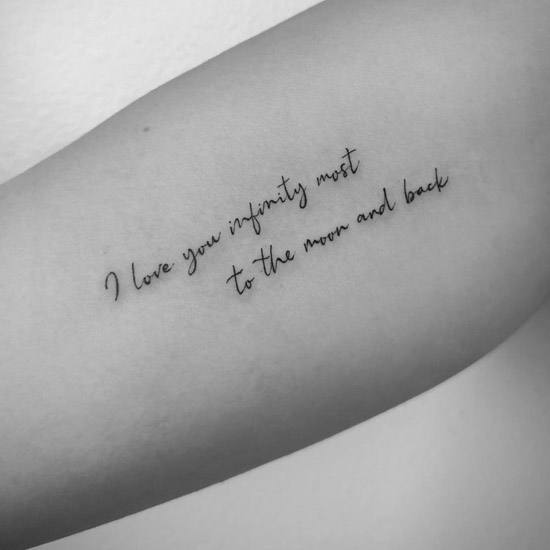 quote in inner bicep tattoo