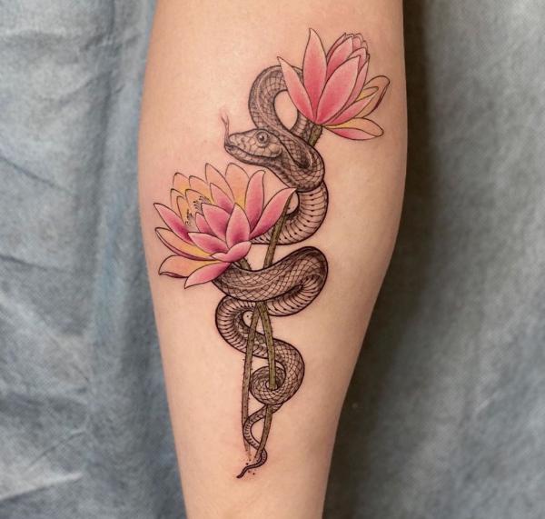Lotus with snake tattoo