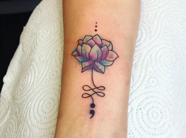 Unalome lotus semicolon tattoo