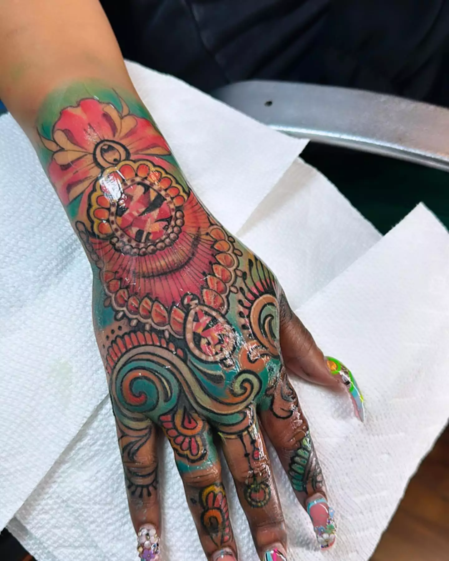 Vibrantly colored hand tattoo